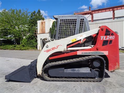 takeuchi tl 240 skid steer|takeuchi tl240 lift capacity.